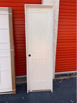 RESO 24-in x 80-in White/Prime Solid Core 2-panel Left Hand Pine Wood Single Prehung Interior Door