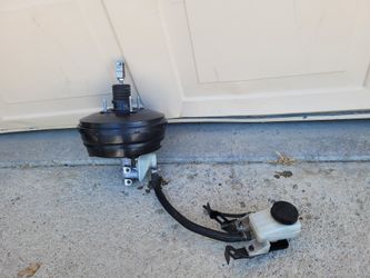 2009/2014 NISSAN BRAKE BOOSTER W/ MASTER CYLINDER & FLUID TANK RESERVOIR OEM