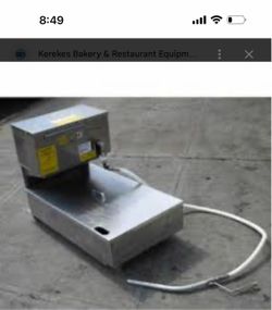 Oil filter machine