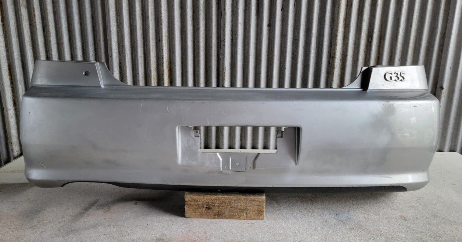 2005-2006 Infiniti G35 Sedan Rear Bumper Cover OEM