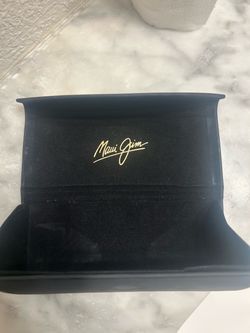 Maui Jim sun glasses.
