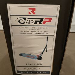 Brand new Root industries scooter Teal/red