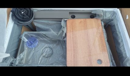 Kitchen Sink with Cutting Board and Accessories