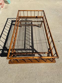 Antique wooden folding child’s bed