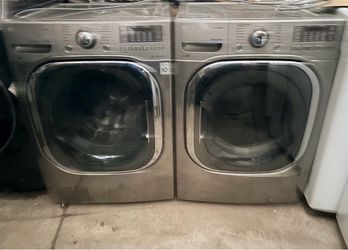 LG WASHER 5.6cubic. And gas DRYER