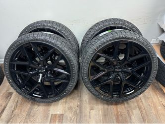 NEW 24 inch gloss black Gm style wheels wrapped in atturo ATS 305/35r24 tires