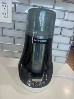 Baby brezza  bottle and breast milk Warner