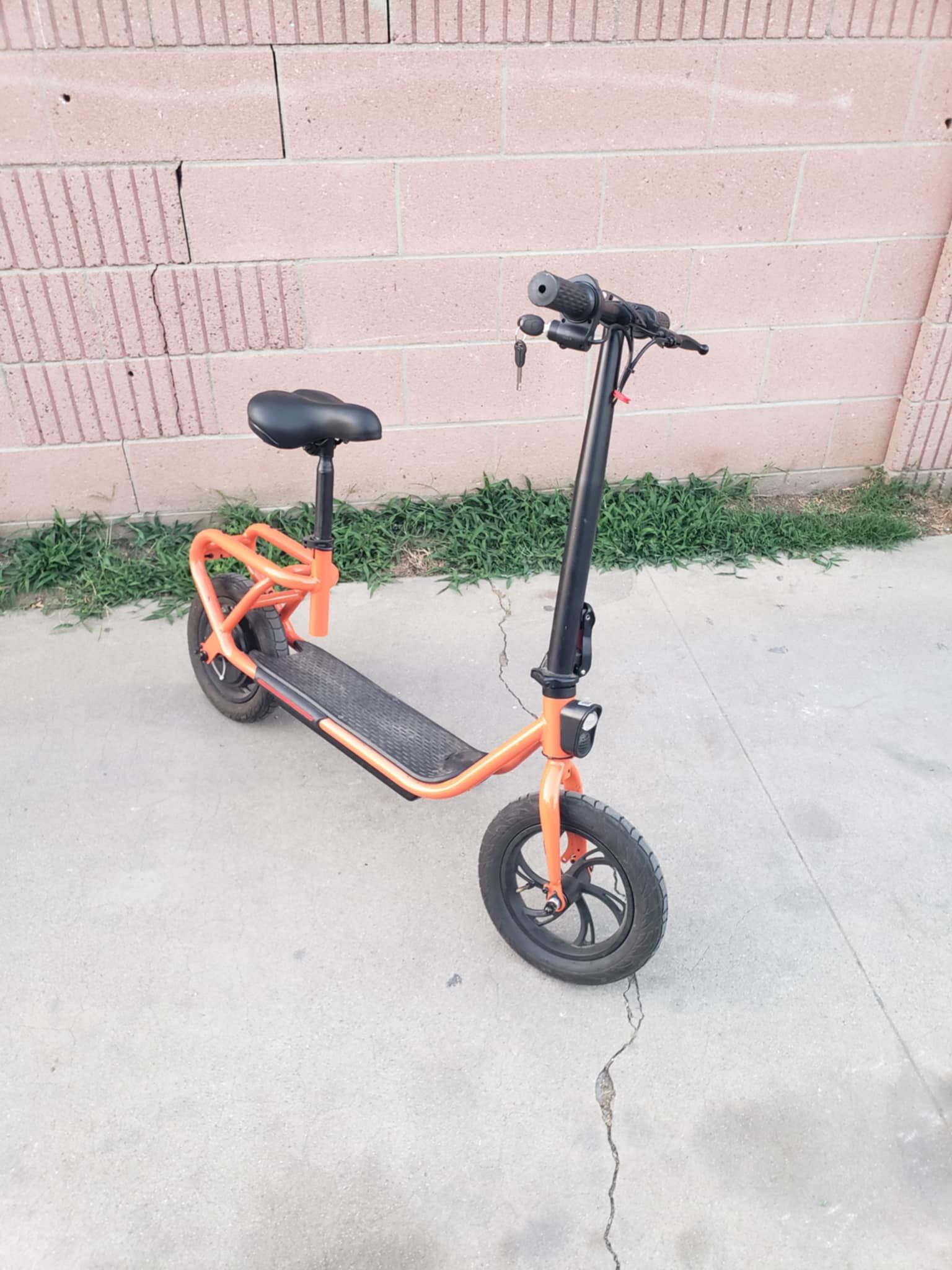 Electric scooter Orenge & Black Can Support big Chubby Person 350lb will still move 18mph 25 miles range. All work 100% ebike e-bike Electric bike wit
