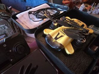 Practically new yellow drone flies really good in everything.
