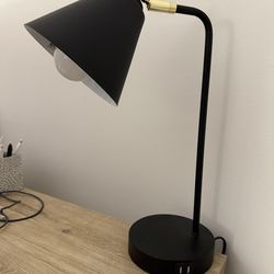 Lamp, charging station, activated by touch