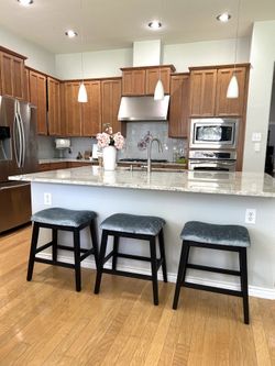 3 newly refurbished counter height barstools