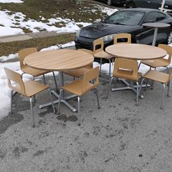 2 very nice solid tables and chairs. Came from a restaurant. 4 chairs each but I could possibly get 1 more for each.