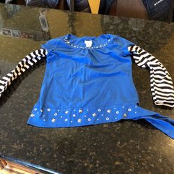 Lots of girl clothes sizes 7/8 and up. Lots of justice clothes