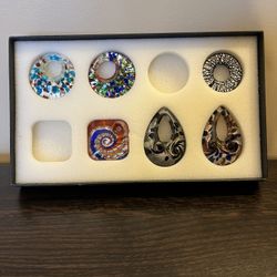 This is a set 6 of assorted glass millefiori Modern pendants
