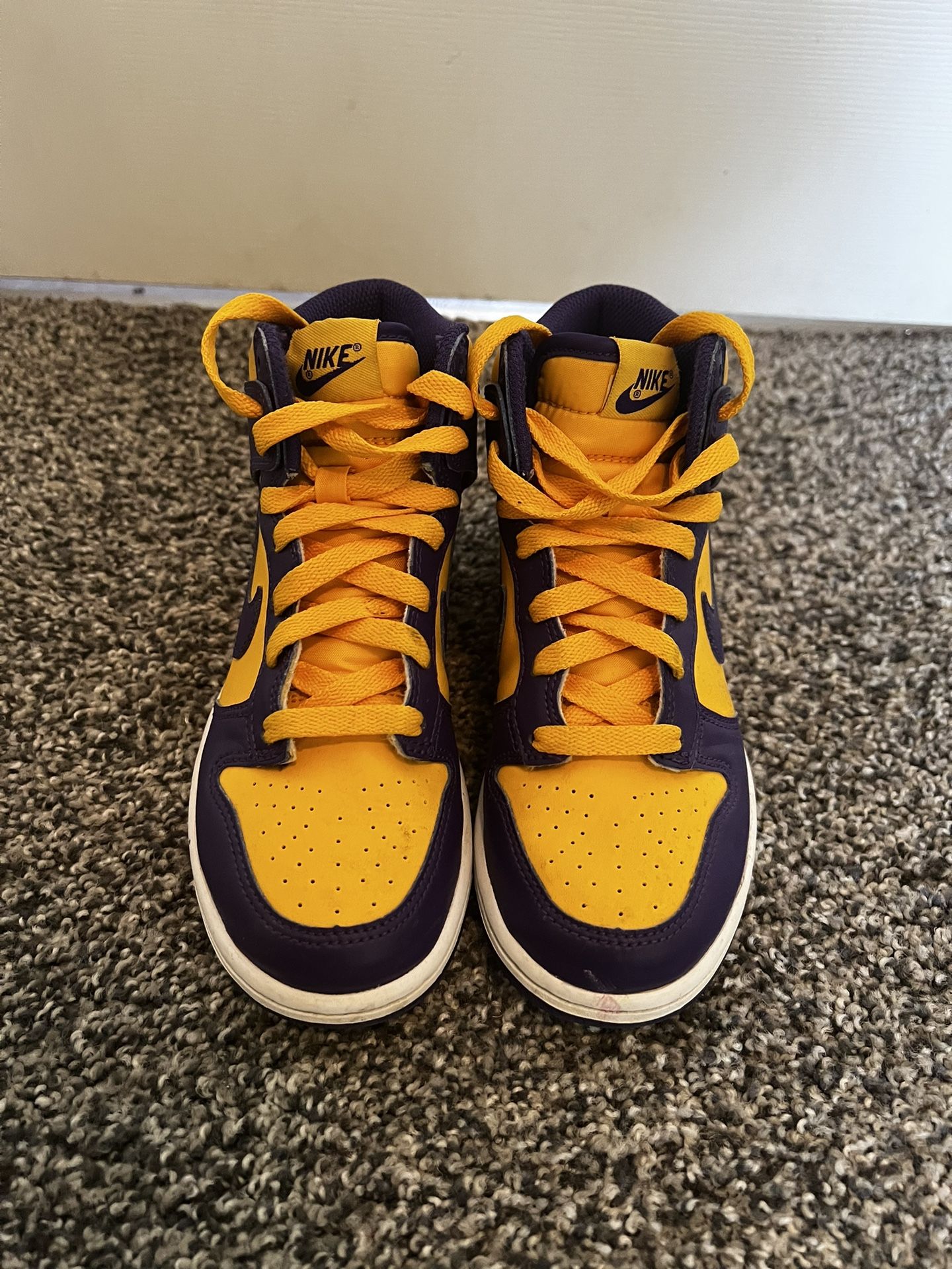 Purple/Yellow Jordan 1’s