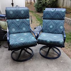 Two swivels patio chairs also rocks.