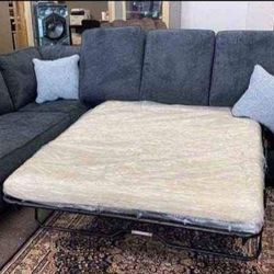 Pull Out Bed Sectional Financing Available By ASHLEY 