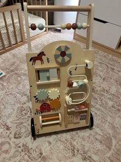 Wooden baby walker