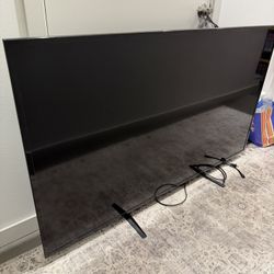 Vizio TV — 57”W, 32”H, 99”Diagonal 