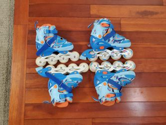 Barely used 2 pairs of roller skates