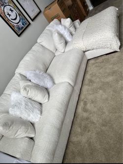 Ashley’s Off White / Beige Couch