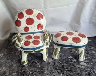 Beautifully Hand-painted Banks. Chair and Foot Stool Set. New, never been used. 
Retailed for $40. I'm only asking $14 for set.