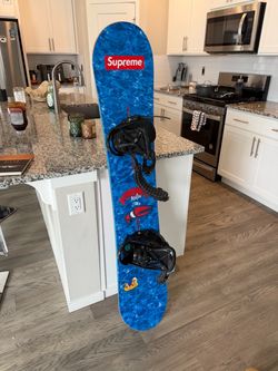 Burton Dominant Snowboard + Burton Bindings — Eye-Catching Blue Water Graphics