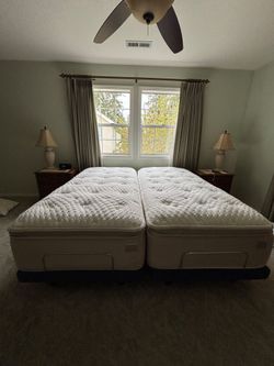 2019 Serta motion series king size adjustable bed with 2 remotes.