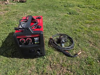 Lincoln 140 welding machine with gun and ground pole