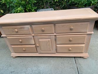 Light wood dresser with drawers