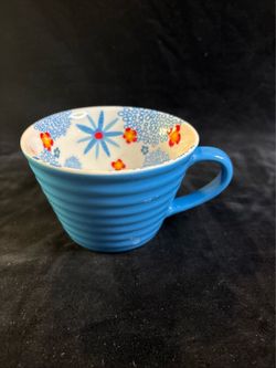 Starbucks floral coffee mug.