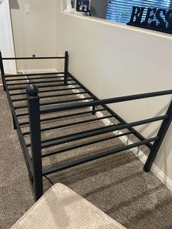 Twin size metal bed frame with charging port