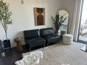 Black mid century armless chair