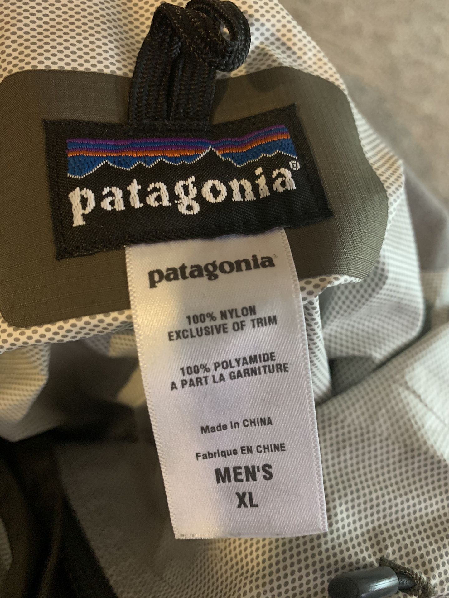 Brand new Patagonia raincoat/windbreaker XL jacket Retails for $129 will sell for $50!