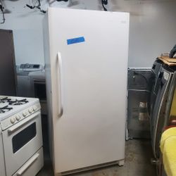 Big freezer  with 32 inches and height 72 1/2 Frigidaire