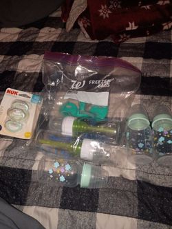2 glass bottles, 3 plastic and 3 pacifiers new.