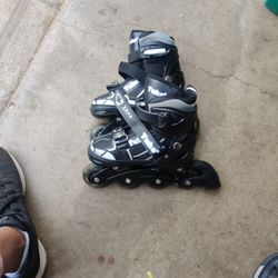 Roller blades Size:Small (30 -34 )