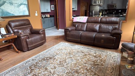Leather power recliner sofa and headrests with a oversize recliner chaor