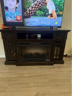 Dark wood electric fireplace