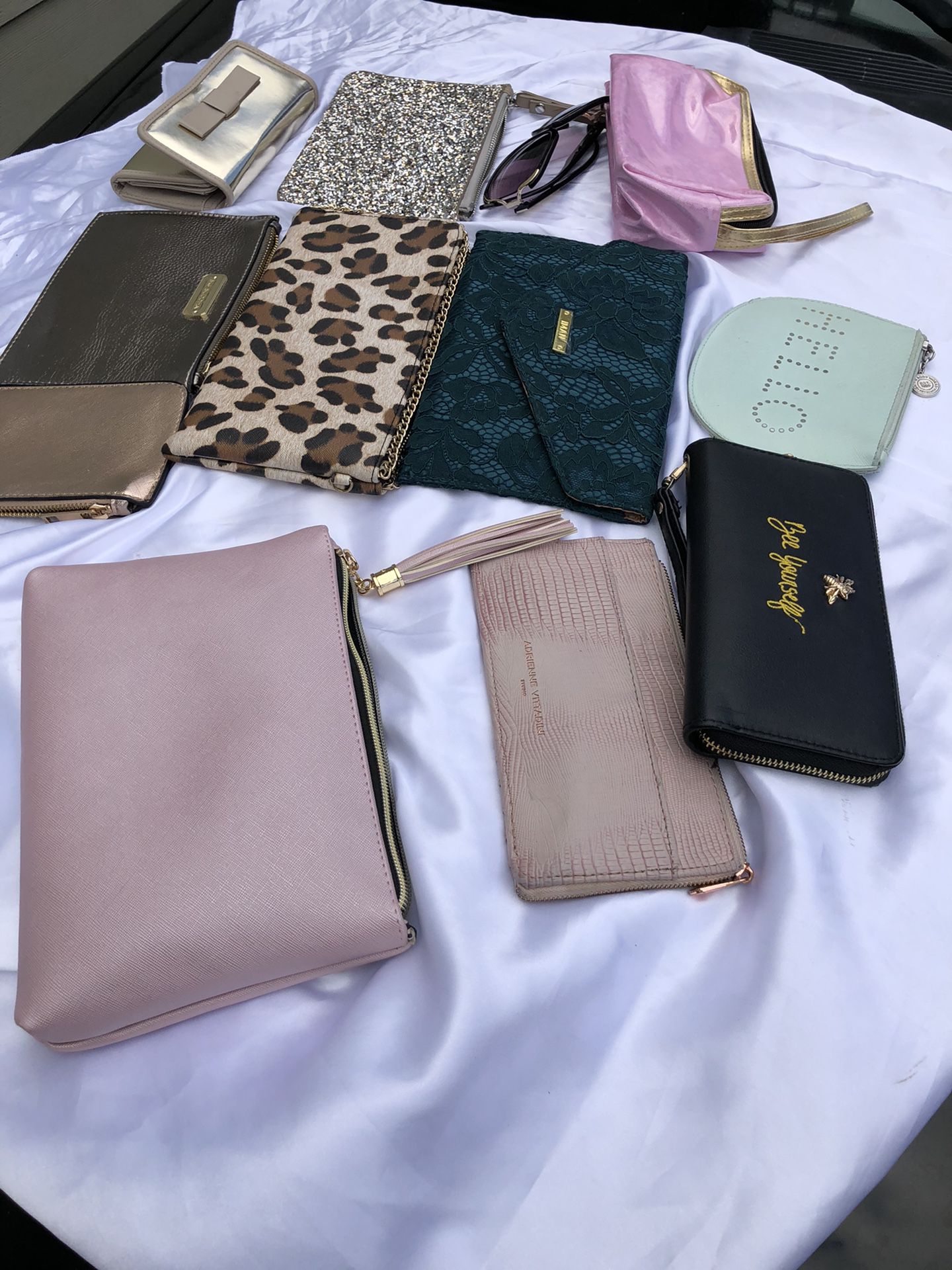 (Lightly-Used)clutch purses ($46) for the lot