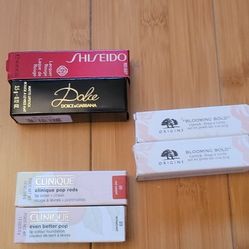 Brand New 2 Clinique and 2 Origins blooming bold and 1 Dolce and 1 Shiseido lip gloss all $45