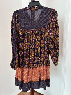 Colorful bohemian style dress with intricate patterns.Hazel brand.