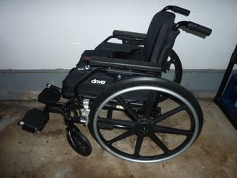 Wheelchair with cushion and foot rest