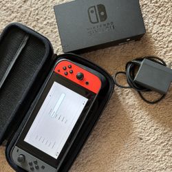 Nintendo switch W/ Case, Grips, Dock & Charger