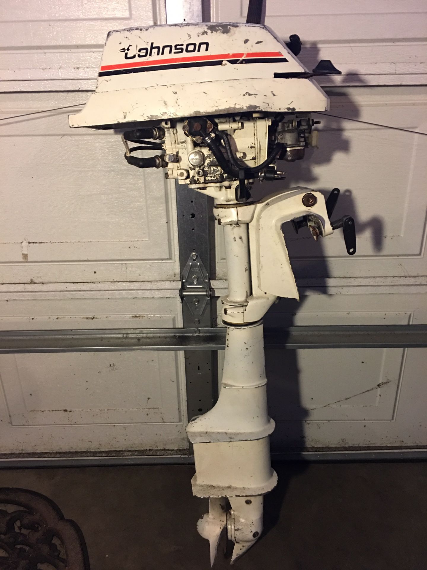 Johnson/Evinrude 4 HP long shaft outboard, not running, has compression. Parts motor only.