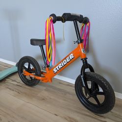 Strider 12 Sport Bike And Globber Stroller