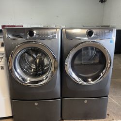 Beautiful Electrolux electric washer & dryer set with pedestals.  