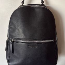 Black Nine West backpack featuring faux leather construction and silver hardware