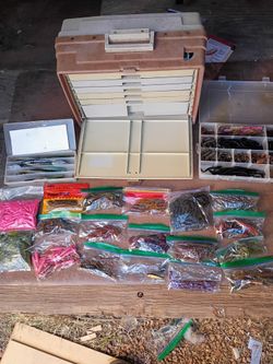 Vintage Tackle Box Loaded With Worms, Fishing pole and More.
