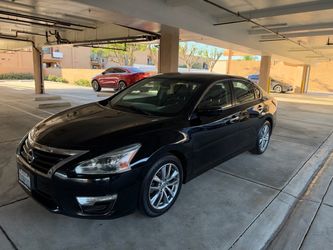 Nissan Altima año 2015 -  127000 millas